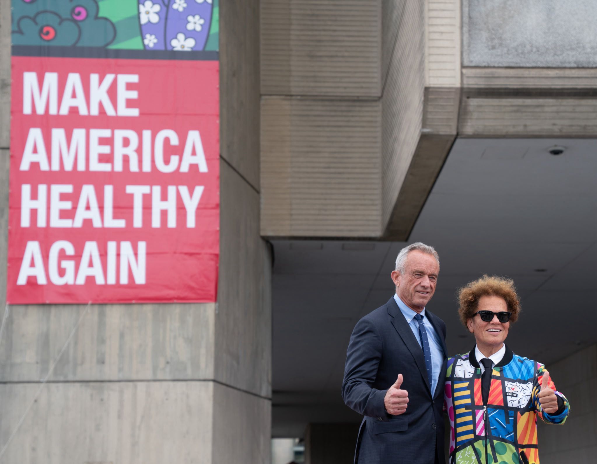 XL Eagle team and Creative Edge Signs celebrating successful project completion